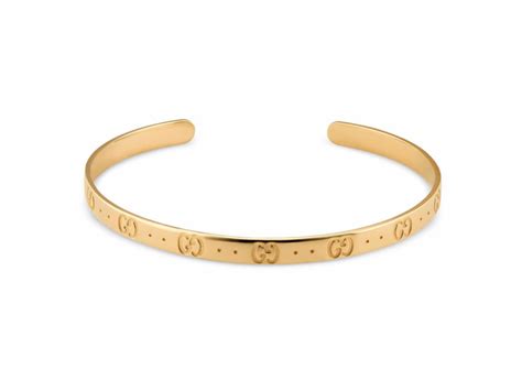 bracciale gucci piastrina con nome|Bracciale rigido con scritta Gucci.